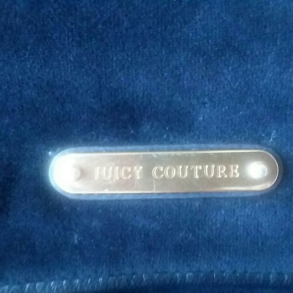 Juicy Couture Black satchel!!!!!!! Poka-Dot Interior soft material
ITEM #1 - Picture 12 of 16